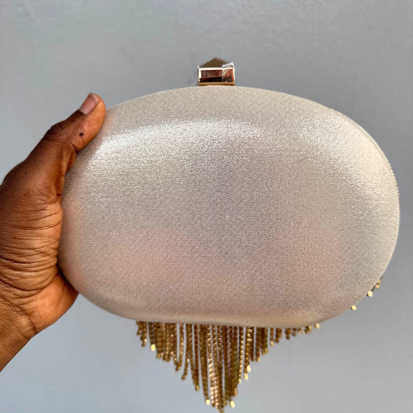 Nina Tassel Embellished Oval Clutch Purse