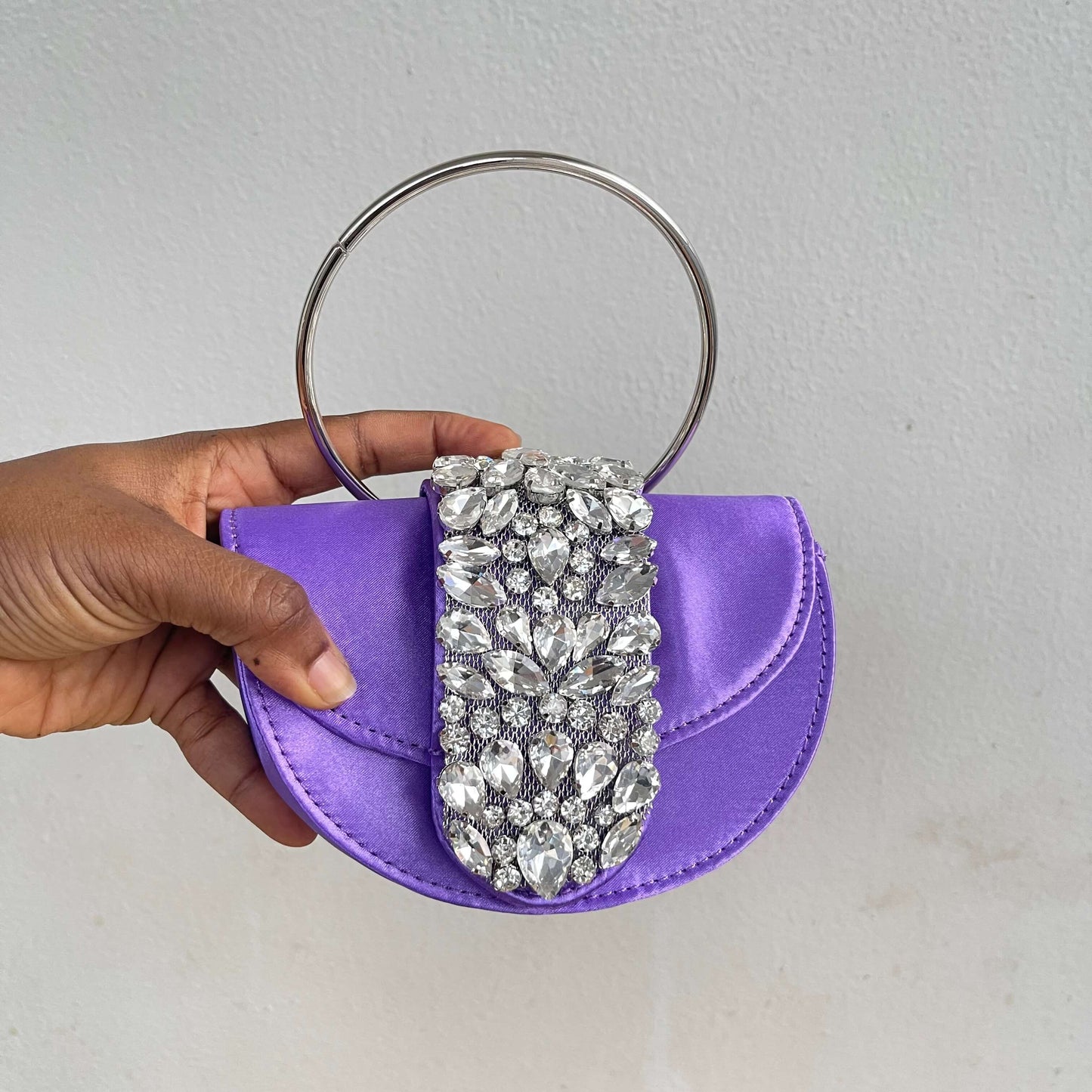 Small Ring Embellished Clutch